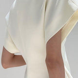 Cevalin | Top Skulpturel Silhuet med Guldspænde