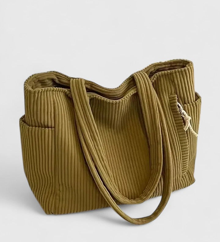 LIORANE | RIBBET SHOPPINGTASKE MED EKSKLUSIV SNØREDETALJE