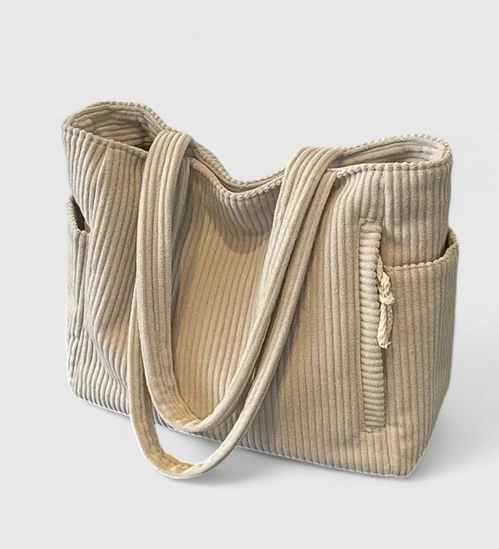 LIORANE | RIBBET SHOPPINGTASKE MED EKSKLUSIV SNØREDETALJE