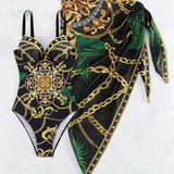 Darius | Push-up badedragt i ét stykke med dekorative kædedetaljer og strandnederdel