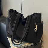 Tilda™ | Riflet taske med snordetalje