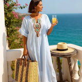 SAGA KJOLE | Lang kjole med decoteret hals og sideslidser