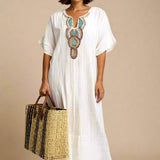 SAGA KJOLE | Lang kjole med decoteret hals og sideslidser